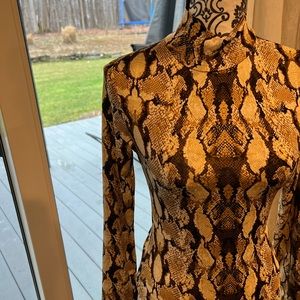 NWT Bodysuit. Animal print, stretchy, high neck.